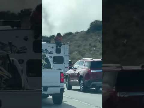 Man on a RV trailer traveling southbound I-15