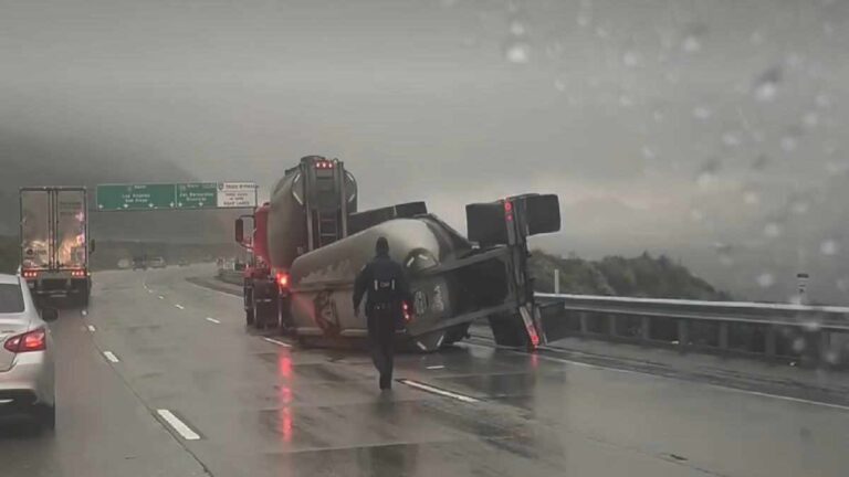 A Semi Trailer Overturned in the Cajon Pass Snarls Traffic on a Rainy ...